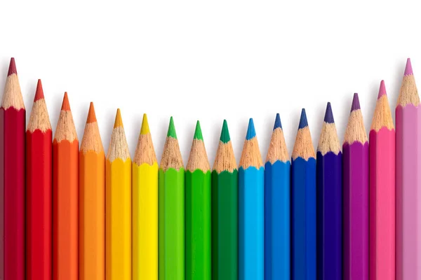 Color pencils concave curve isolated on background. Close up.