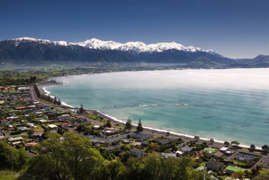 Kaikoura township with clearing morning fog. South Island,New Zealand clipart