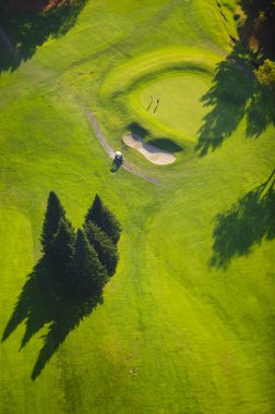 Aerial image of a golf course. clipart