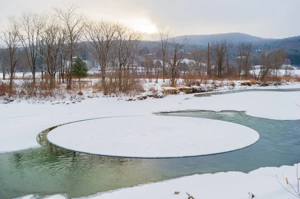 Rare ice circle in the Little River near Moscow Vermont USA