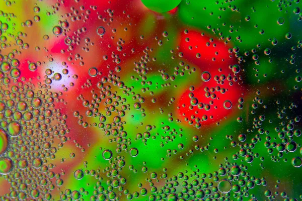 Bubbels Olie Water Groene Rode Kleur Abstracte Achtergrond — Stockfoto