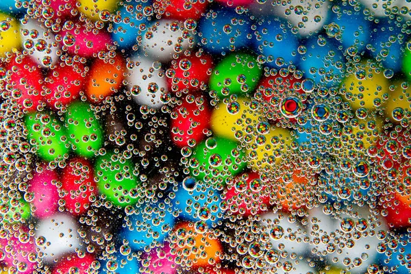 Bubbels Olie Water Een Kleurrijke Snoepjes Abstracte Achtergrond — Stockfoto