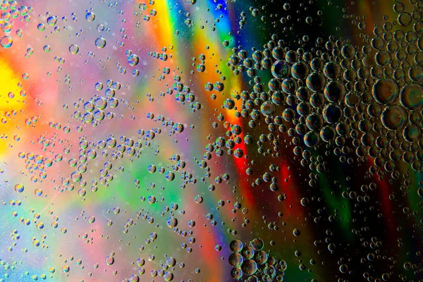 Bolle Olio Acqua Uno Sfondo Macro Astratto Arcobaleno — Foto Stock