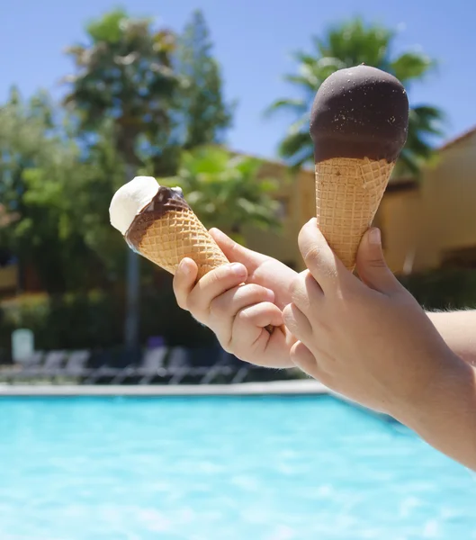 Ice cream in a child's hand close-up