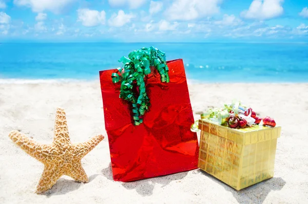 Starfish with gifts - holiday concept — Stock Photo, Image