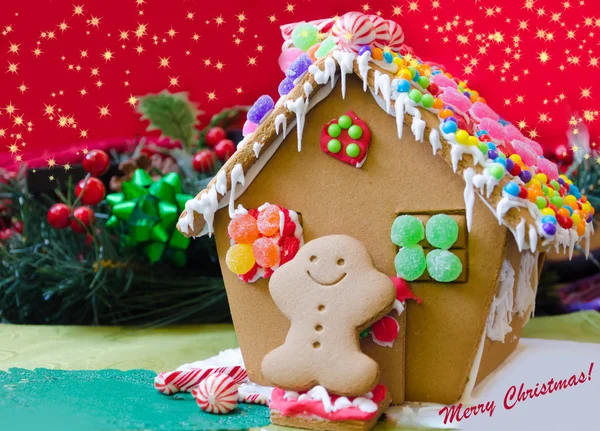 Gingerbread man by the house — Stock Photo, Image