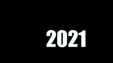 Mutlu yıllar 2022. Koyu arkaplanda metin animasyonu 2021 'den 2022' ye değiştirildi.