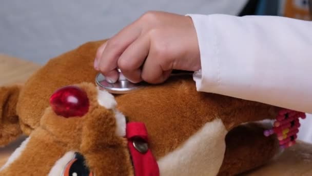 Cute Young Girl Playing Doctor Stethoscope Stuffed Toys Home — Stock Video