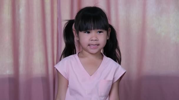 Portrait Happy Smiling Little Girl Pink Curtain Background Home — Stock Video