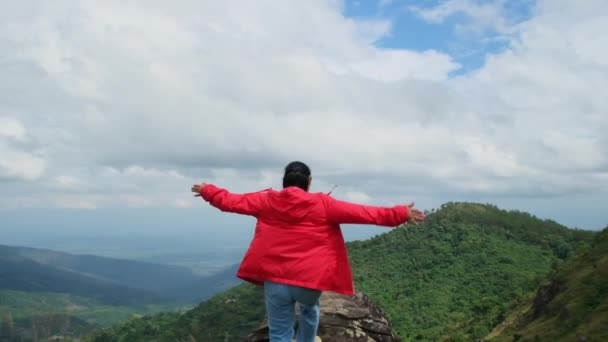 Young Asian Hiker Woman Red Raincoat Standing Top Mountain Raised — Stock Video