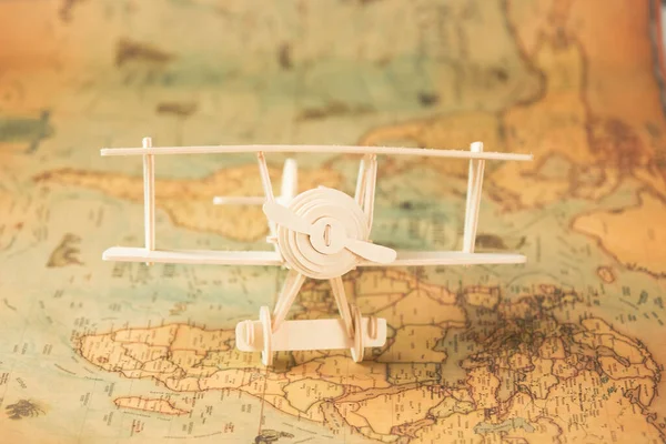 Wooden Toy Plane World Map Table Travel Vacation Concepts — 스톡 사진