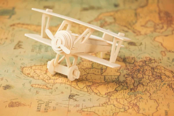 Wooden Toy Plane World Map Table Travel Vacation Concepts — 스톡 사진