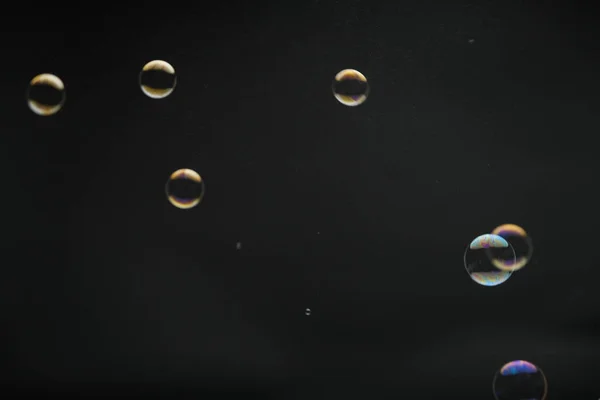 Flying Soap Bubbles Black Background Abstract Soap Bubbles Colorful Reflections — Stockfoto