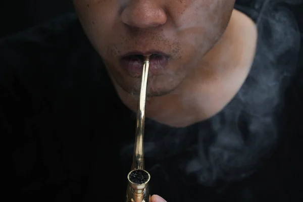 Asian Man Smokes Marijuana Pipe Home Studio Shoot Model Simulating — Fotografia de Stock