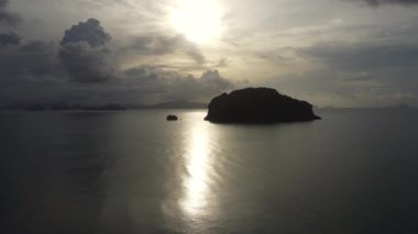 Beautiful view of the island in the tropical sea during sunset, Phang Nga, Thailand. Beautiful natural landscape background.