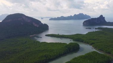 Aerial view of Phang Nga Bay Surrounded by limestone mountains and fertile mangrove forests in the Andaman Sea. Phang Nga, Thailand. Samet Nangshe, Unseen thailand.