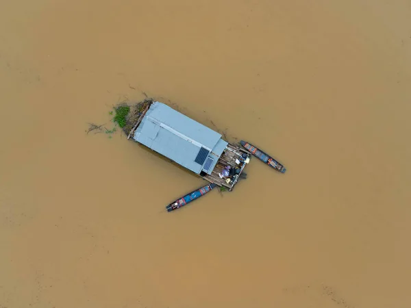 Aerial view of boats and houses flooded in rural Thailand. Climate change concept