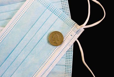 İngiltere 'nin ulusal para birimi sterlin ve tıbbi maskedir. Coronavirüs