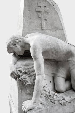 Yaralı savaşçı ve mezar. Ölümün sembolü