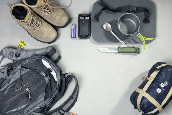 Outdoor travel equipment planning for camping trip, in flat lay with copy space