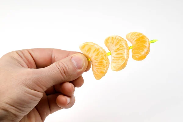 Three Orange Tangerine Slices Pierced Canapes Hand Close White Background — Stock fotografie