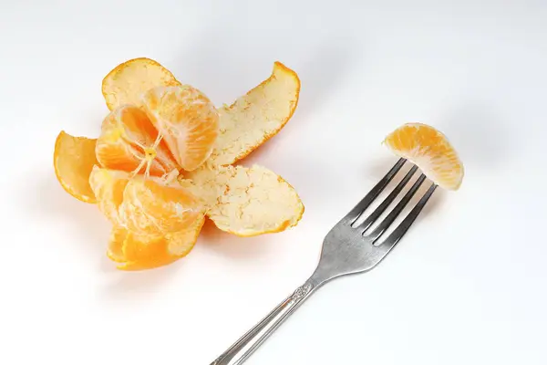 Disconnected Peel Tangerine Juicy Slices Fork White Background — Stock fotografie