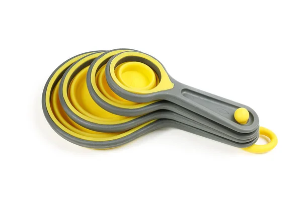 Set Silicone Yellow Measuring Cups Measuring Spoons Kitchenware Cooking Isolated — 图库照片