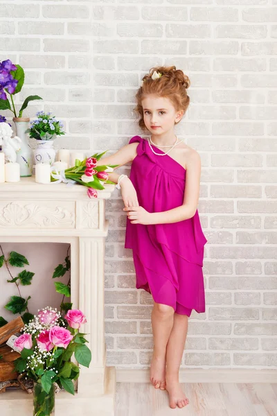 Portrait of a beautiful girl with tulips — Stock Photo, Image