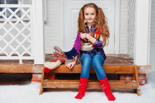 Beautiful little girl on the porch — Stock Photo, Image