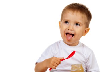 Çocuk bir kaşık ile eats