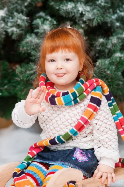 The little girl on sled — Stock Photo, Image