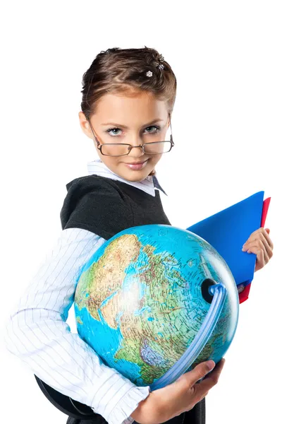 Schoolmeisje bedrijf boek en globe — Stockfoto