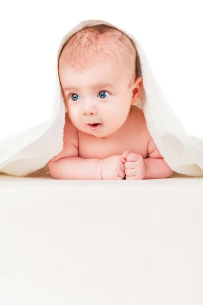 Beautiful baby with a towel — Stock Photo, Image