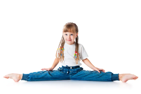 La bambina siede su uno spago — Foto Stock