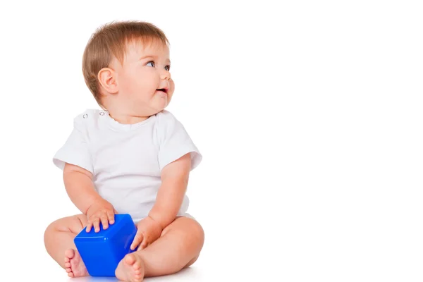 Menino com um brinquedo azul blocos — Fotografia de Stock