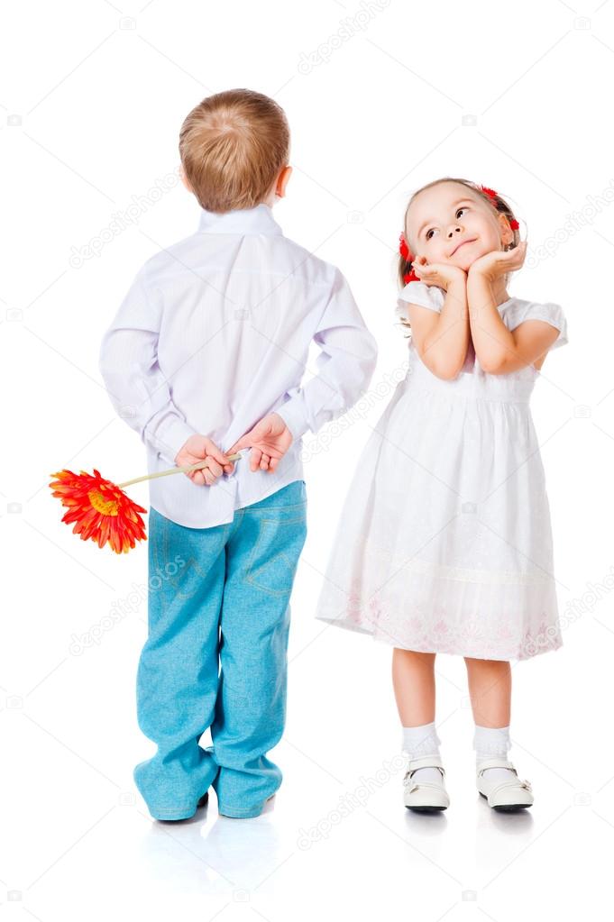 Girl and boy with a flower