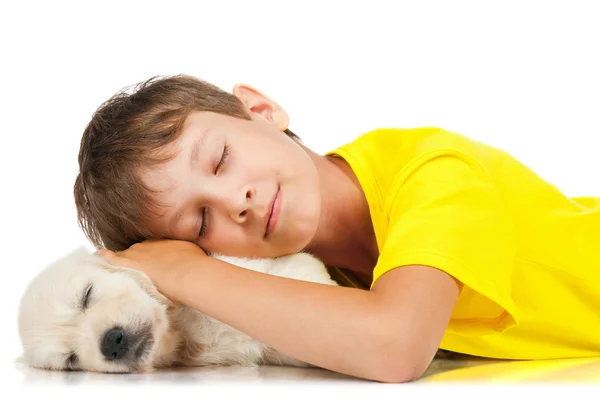 Jongen met een puppy — Stockfoto