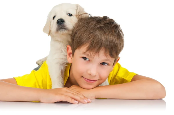 Pojke med en valp — Stockfoto