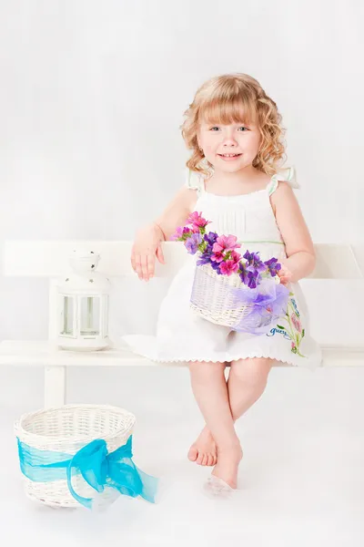 Beautiful girl with lantern, on a gray background — Stock Photo, Image