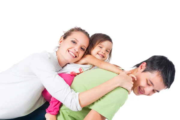 Moeder, vader en dochter knuffelen — Stockfoto