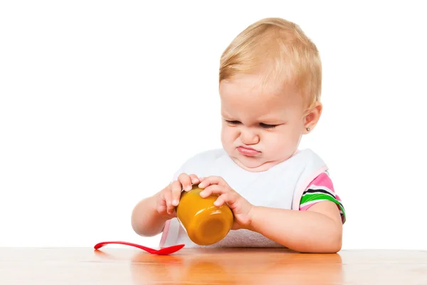El niño come con una cuchara — Foto de Stock