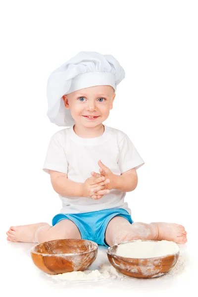 Menino brincando com farinha — Fotografia de Stock