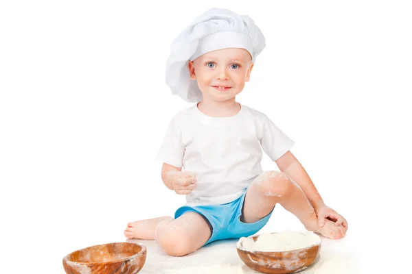 Niño jugando con harina — Foto de Stock