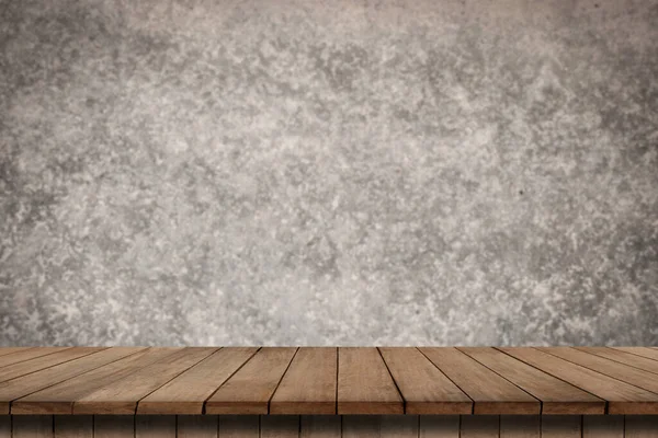 empty table on concrete wall background wall for putting some products and things.