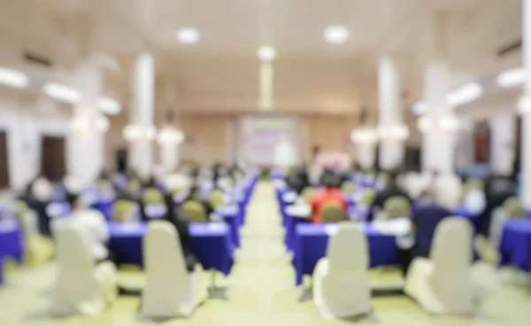 blurry people sitting in the business seminar room in a hotel business background and gaining business knowledge.