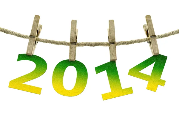 New year 2014, hanging on the clothesline on white background — Stock Photo, Image