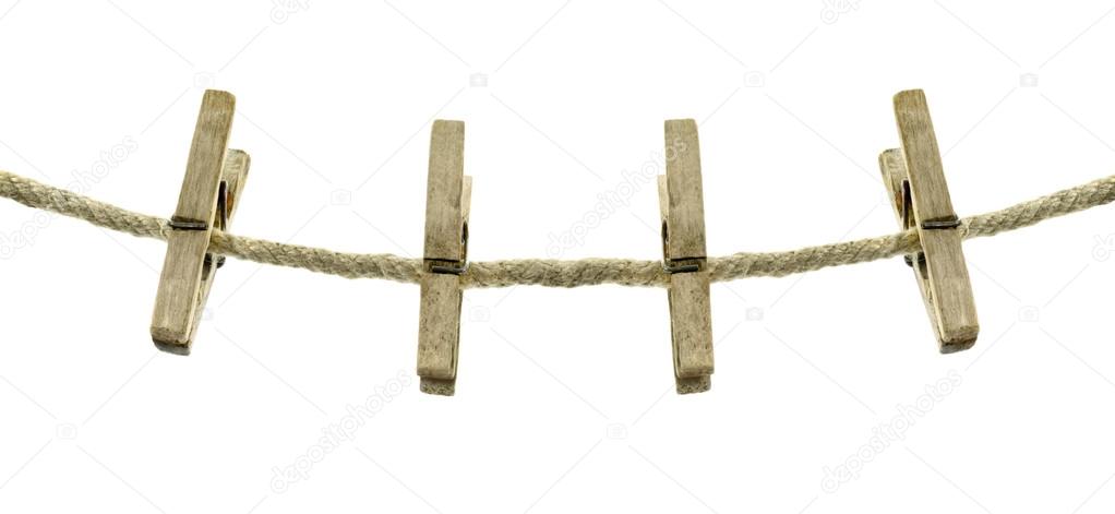 Clothes hang on a rope isolated on a white background