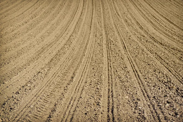 Terreni investiti in campo durante i lavori agricoli — Foto Stock