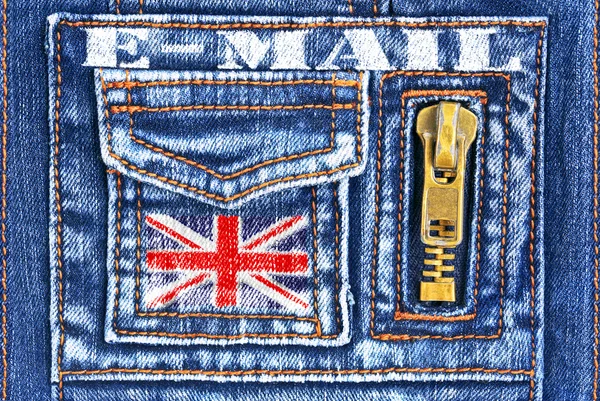 Denim material with a pocket in the form of English mailbox — Stock Photo, Image