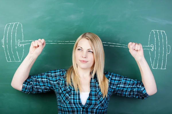 Student Clenching Fists With Barbell Drawn On Chalkboard — Stock Photo, Image